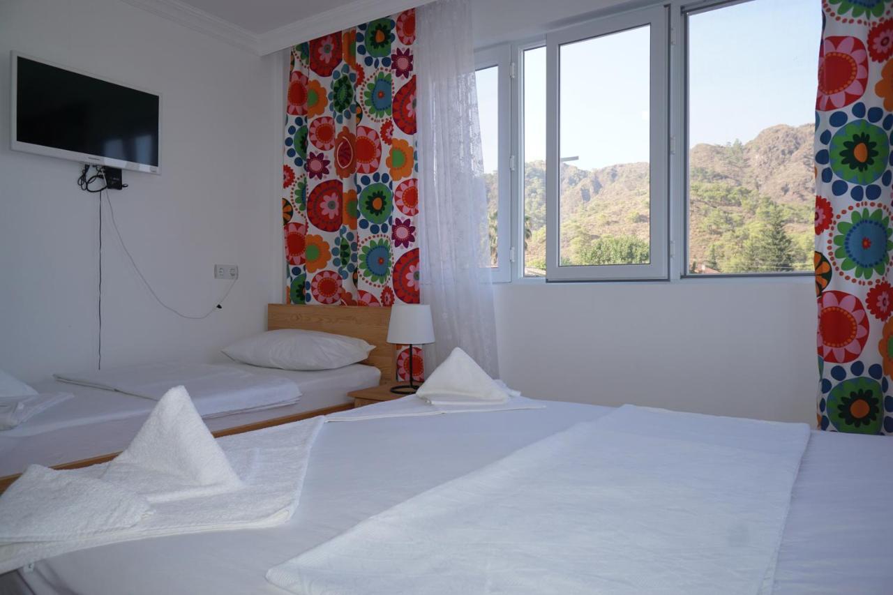 Flora Pansiyon Çıralı Apartamento Kemer Exterior foto
